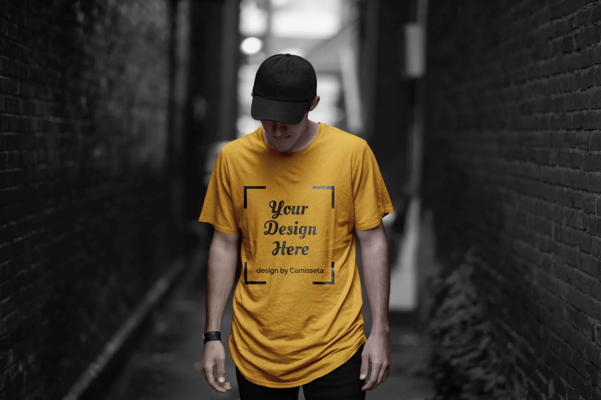 Person wearing a custom gold graphic tee